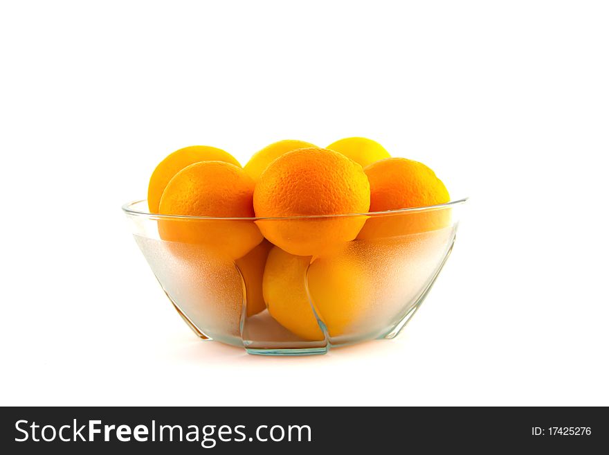 Bowl with oranges isolated on white. Health is necessary.