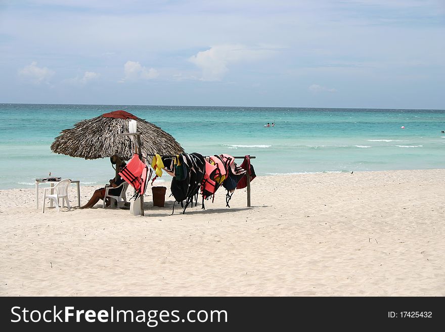 Sunny Cuban beach with super relaxed life guards. Sunny Cuban beach with super relaxed life guards
