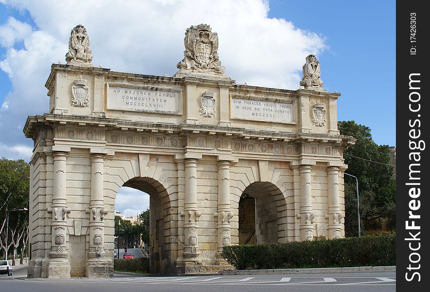 Porte des Bombes arch - ancient ornamental gate, which formed the outer defensive walls of Valletta, Malt