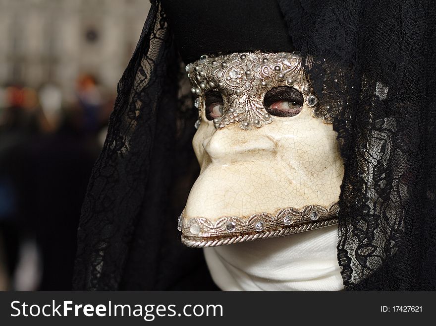 Mysterious Venetian mask during Venice carnival