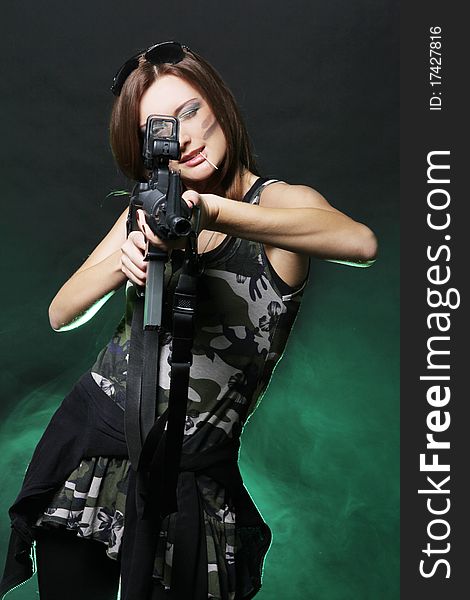 Attractive And Sexy Spy Woman With Assault Rifle Free Stock Images