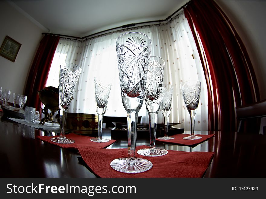 Wine glasses on the red napkins