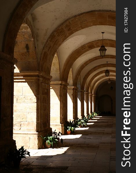 Arcades in monastery in Coimbra, Portugal, Europe.