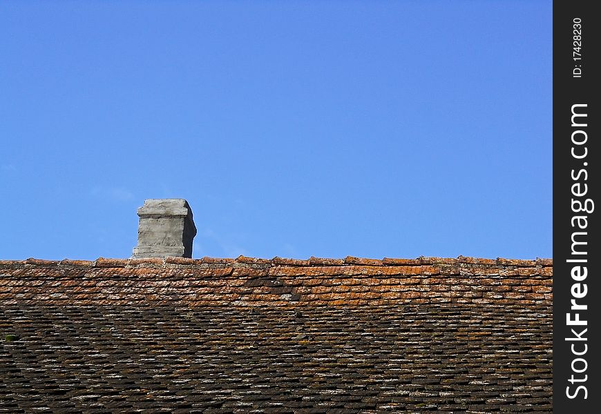 Image of a roof and chimney, countryside house