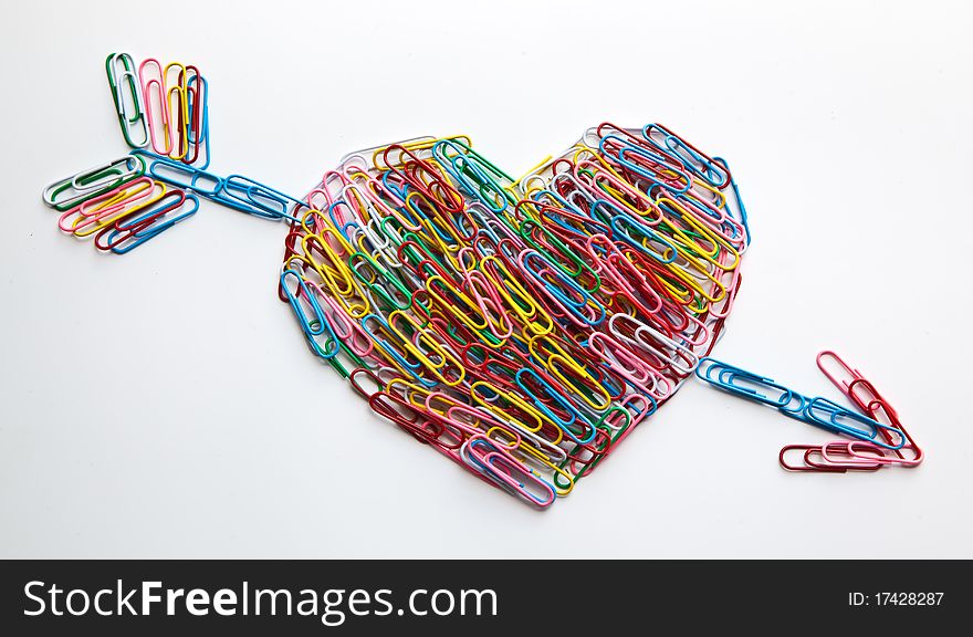 Arrow striked heart paper clips