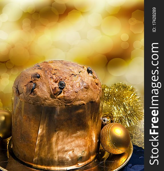 Cake on and bokeh background and Christmas decorations. Cake on and bokeh background and Christmas decorations