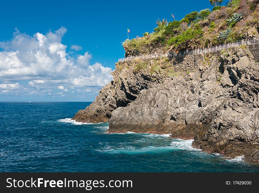 Mountain walk on the cliff at the sea