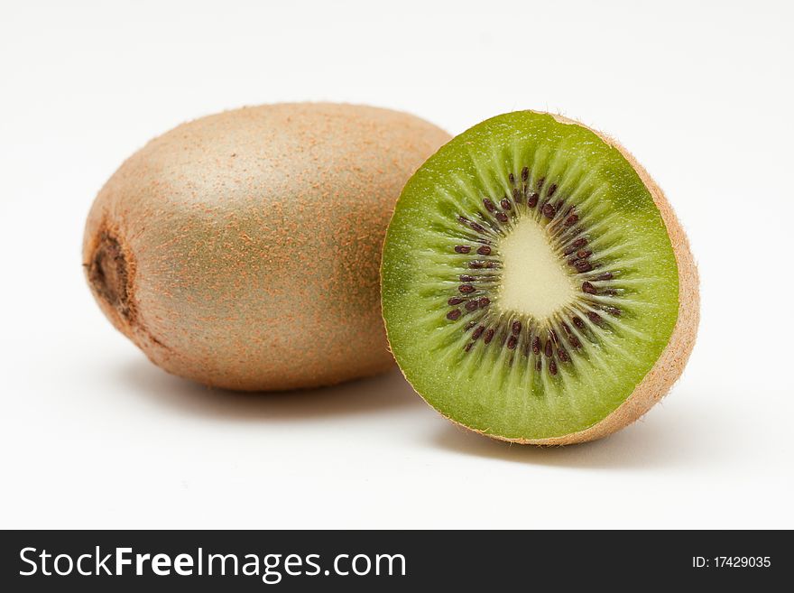 Kiwi fruits isolated on white background - one half ans one whole kiwi fruit