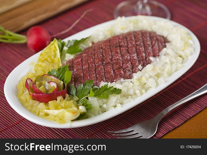 Traditional steak, made with raw mincemeat and eggs