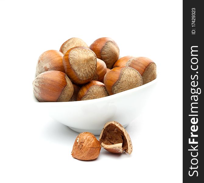 Hazelnuts isolated on white background