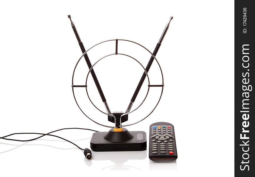 Indoor antenna and remote control TV isolated on a white background. Indoor antenna and remote control TV isolated on a white background