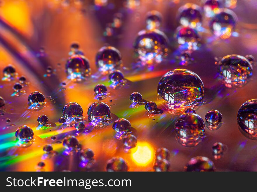 Reflection in drops of water.. Water drops full of color. Macro photography