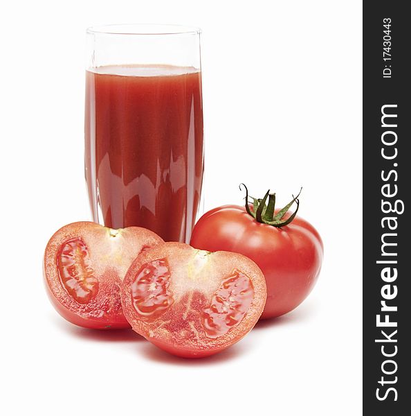 Fresh Tomatoes And A Glass Full Of Tomato Juice