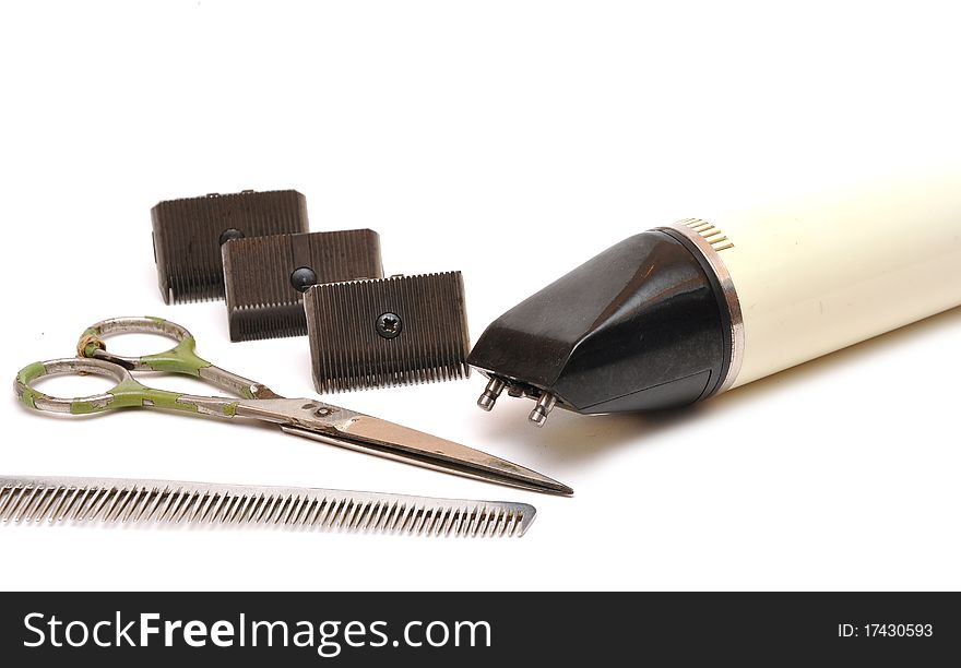 Vintage set of tools for cutting hair on white