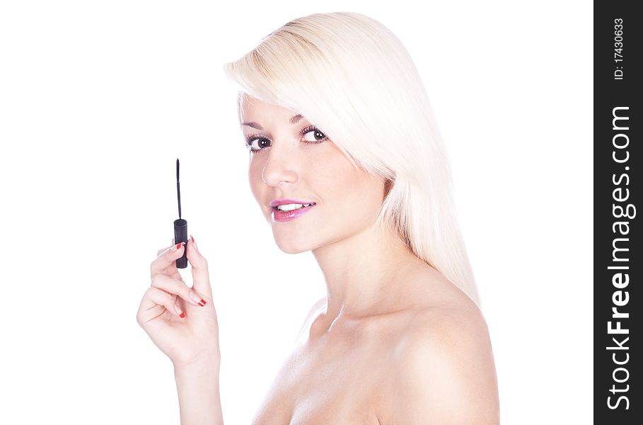 Snapshot of a girl on a white background, with mascara. Snapshot of a girl on a white background, with mascara.