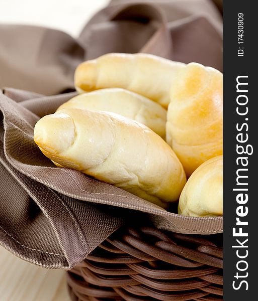 Croissants in a basket with napkin. Croissants in a basket with napkin