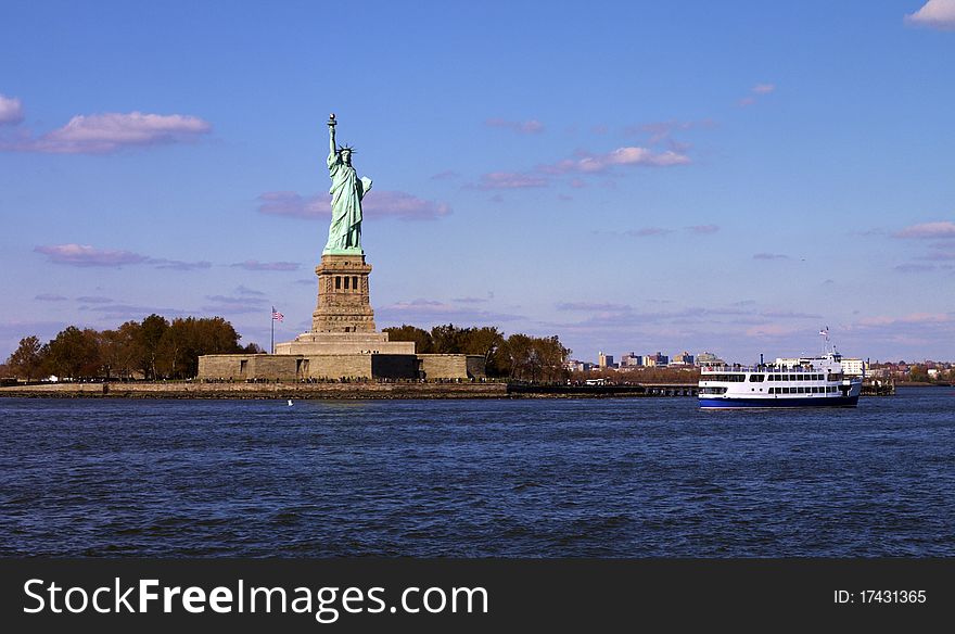 Liberate statue  view from the sea with a boat