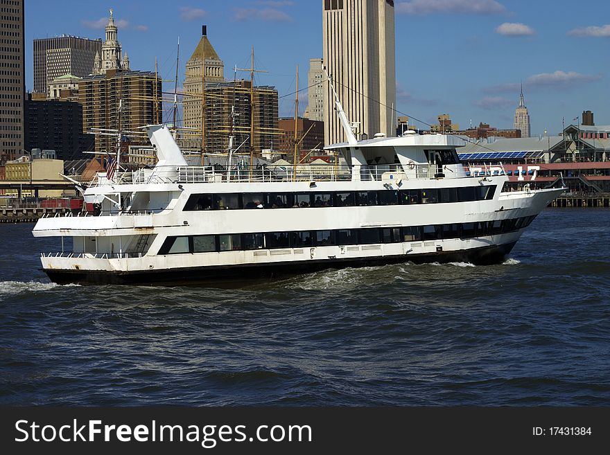 Boat cruising with Manhattan at the background