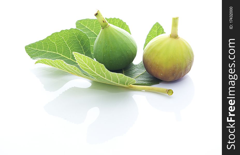 Ripe figs isolated on white background