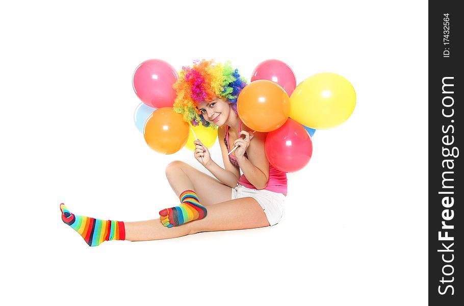 Young happy woman with balloons over white
