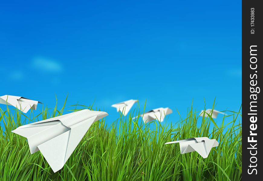 Landscape with clouds, green field and paper planes