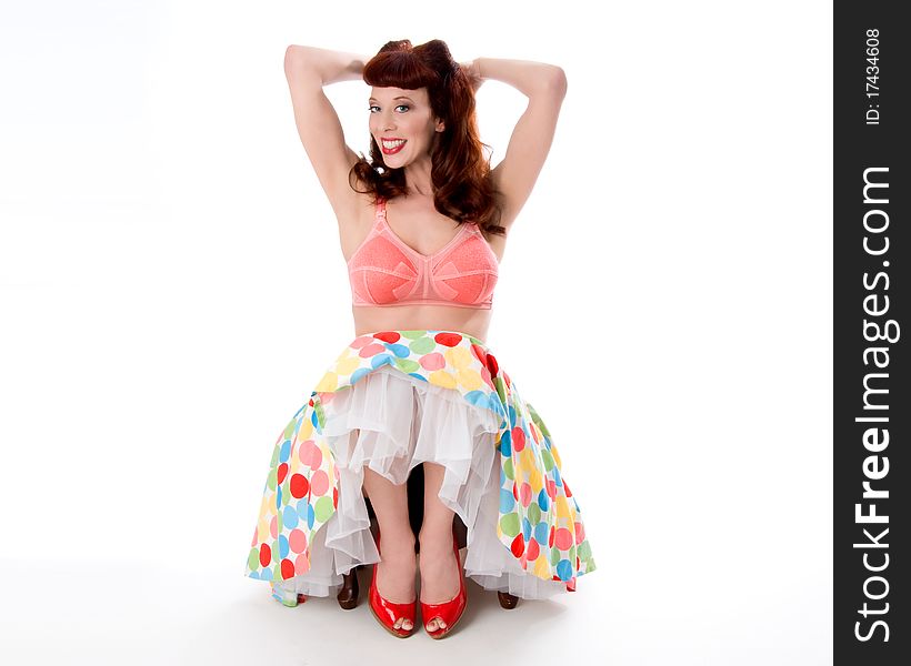 pinup girl wearing bra and polka dot skirt. pinup girl wearing bra and polka dot skirt