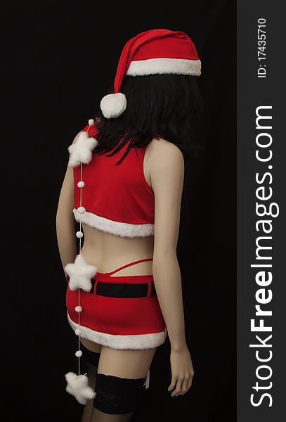 female mannequin  dressed as Santa Claus opens the new year