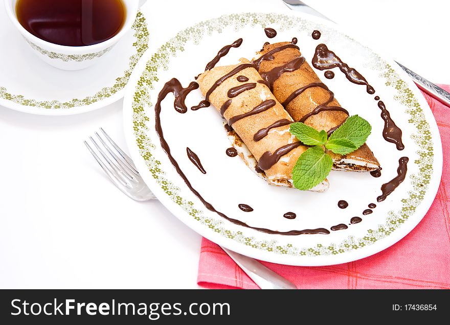 Pancakes with cottage cheese poured chocolate