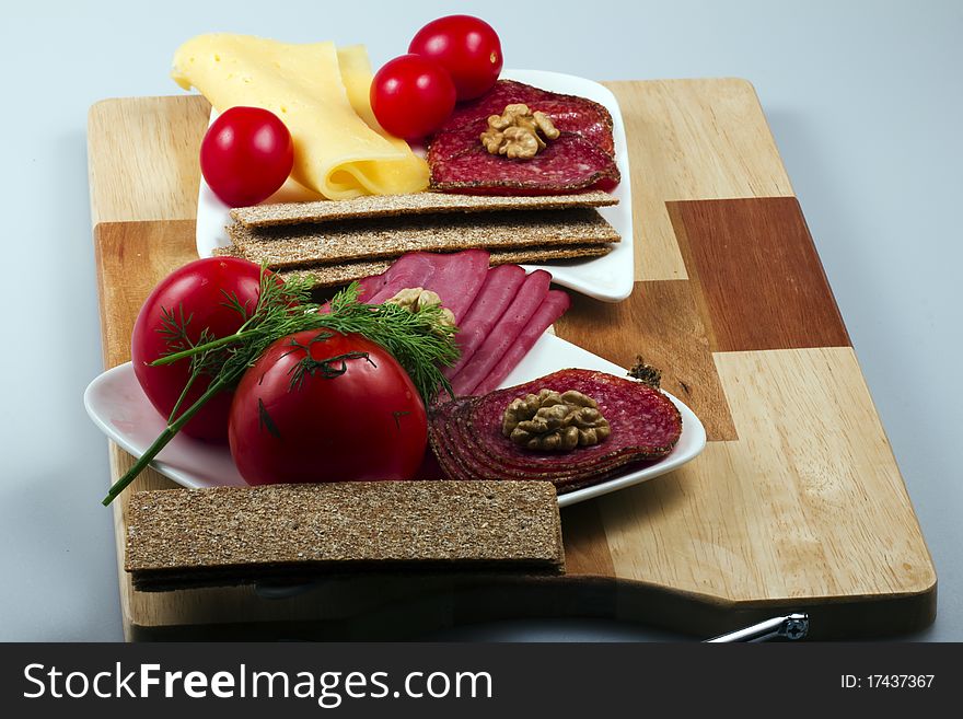 Allsorts meat on a plate with vegetables