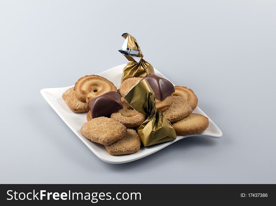 Baking chocolate with sweets on a plate