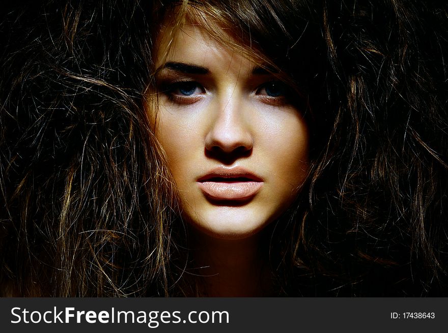 Portrait of the girl with a mad hairdress. Portrait of the girl with a mad hairdress