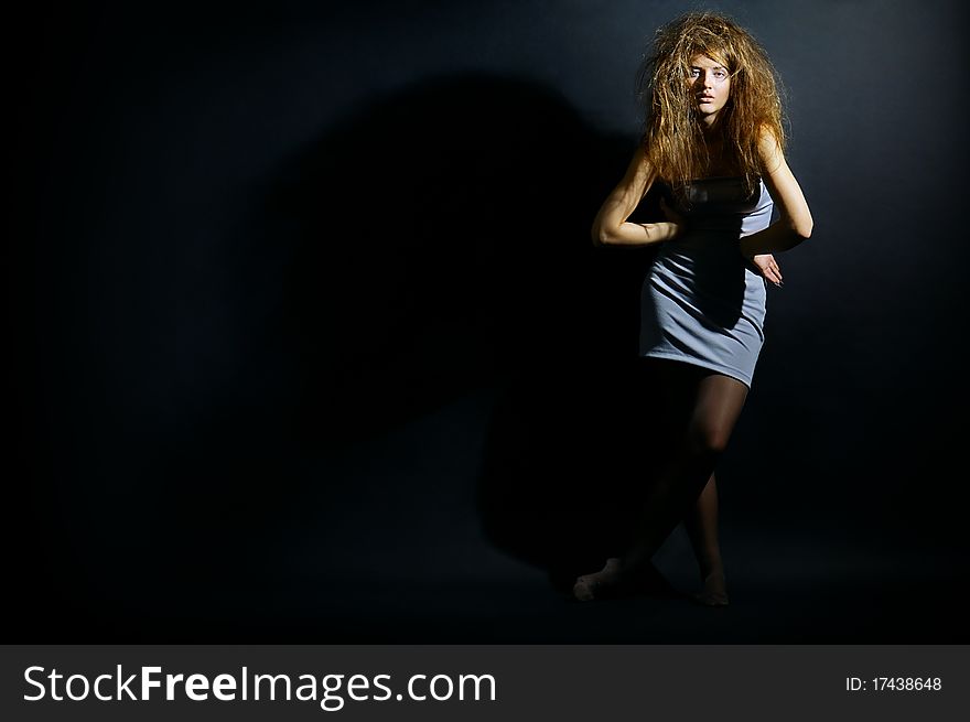 Portrait of the girl with a mad hairdress. Portrait of the girl with a mad hairdress