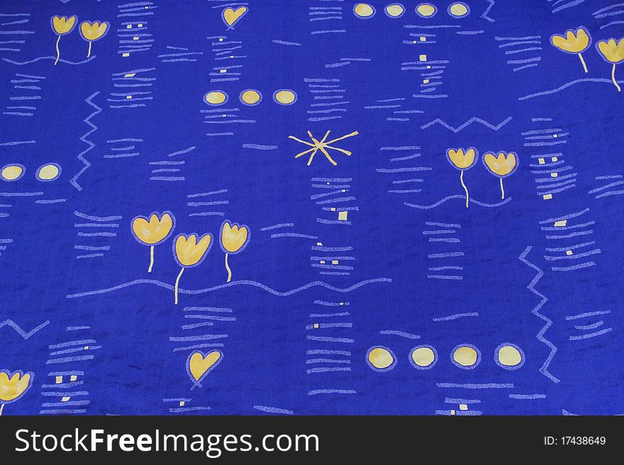 Blanket of yellow flowers and blue background