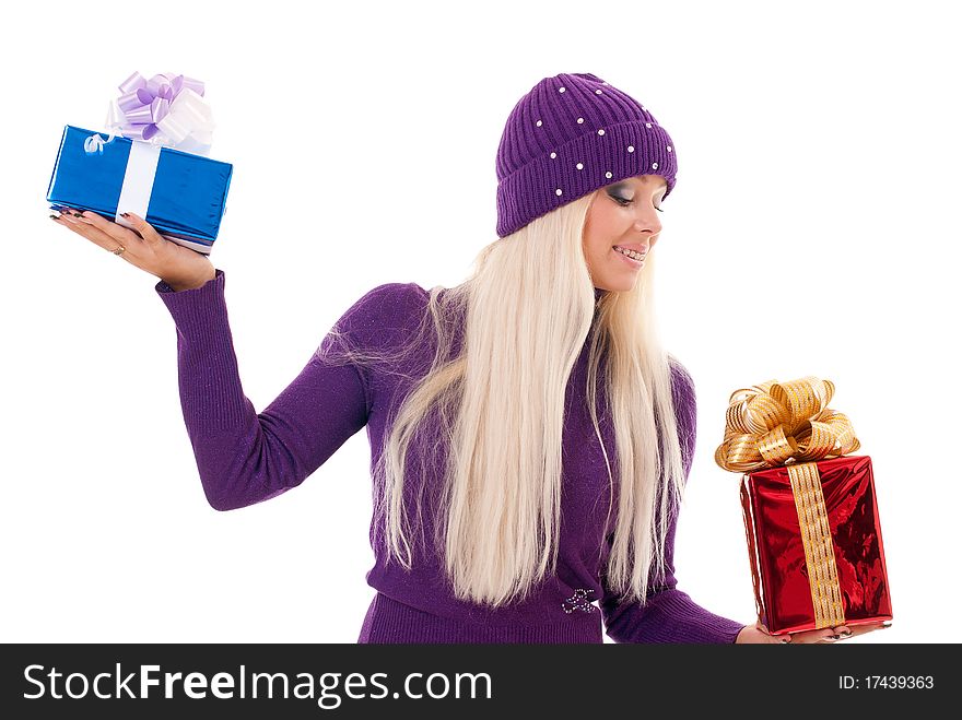 Girl holding a presents on white background