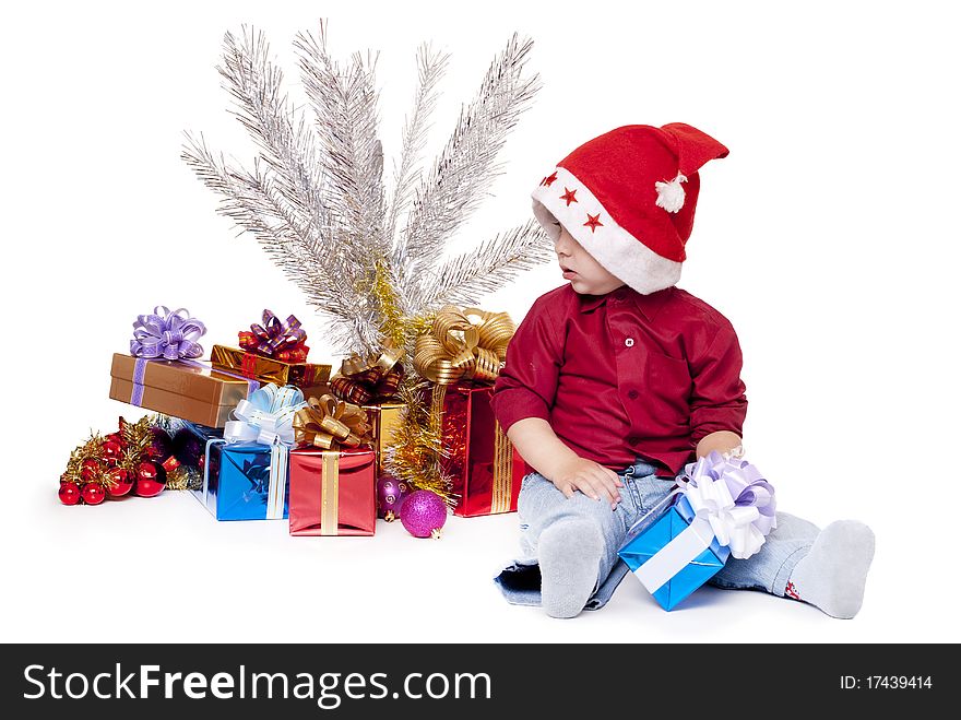 Young boy as Santa Claus isolated on white background. Young boy as Santa Claus isolated on white background