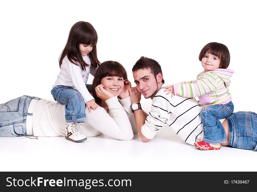 Happiness family with two children isolated on white