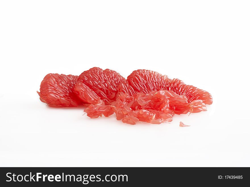 Pulp and lobules of the cleared red grapefruit. Pulp and lobules of the cleared red grapefruit