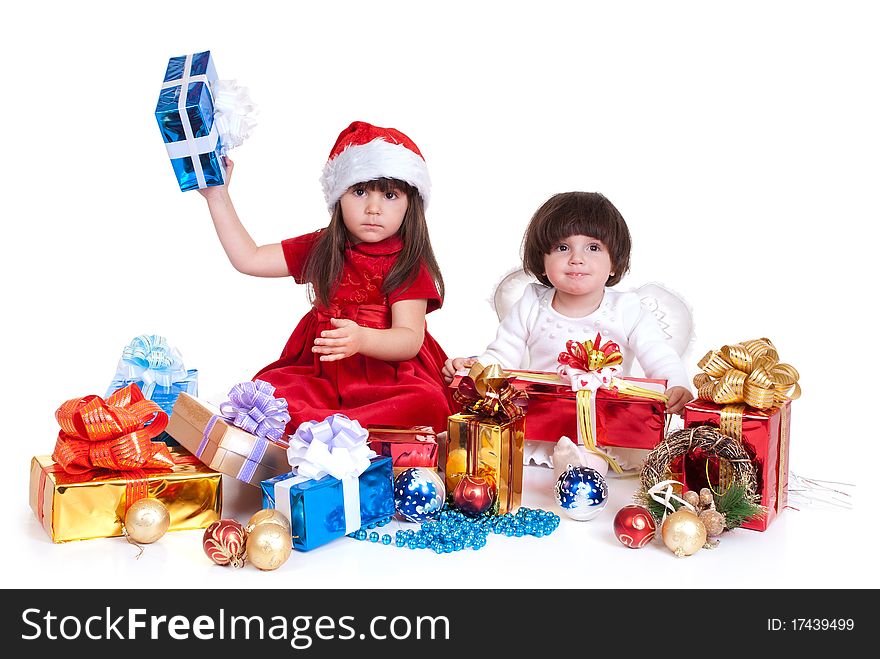 Girl in christmas costume with gift. Girl in christmas costume with gift