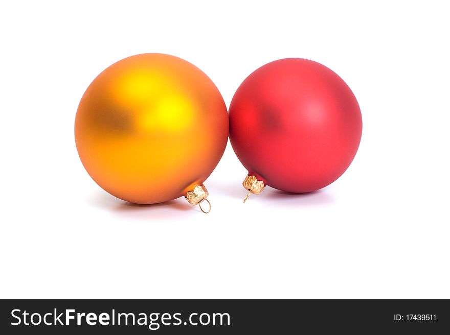 Red and yellow Christmas balls on white background. Red and yellow Christmas balls on white background.