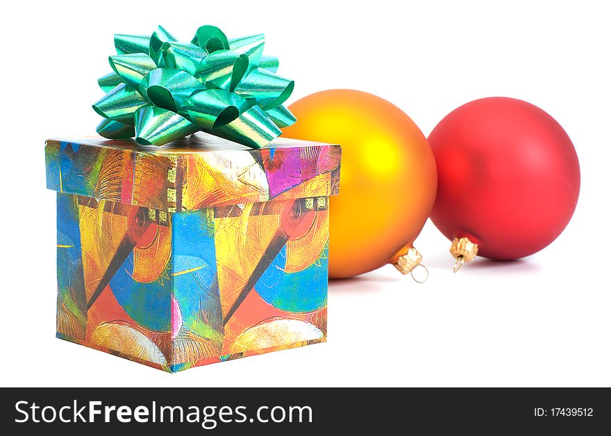 Gift Box and Christmas balls on white background. Gift Box and Christmas balls on white background.