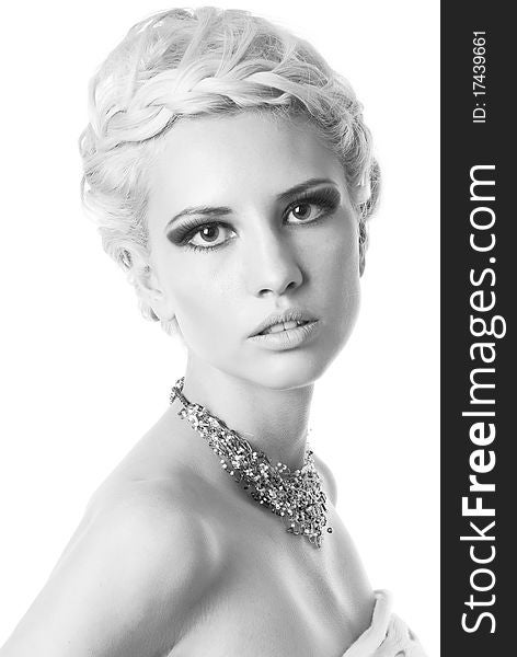 Black and white photo of a blond lady with a beautiful hair isolated on white