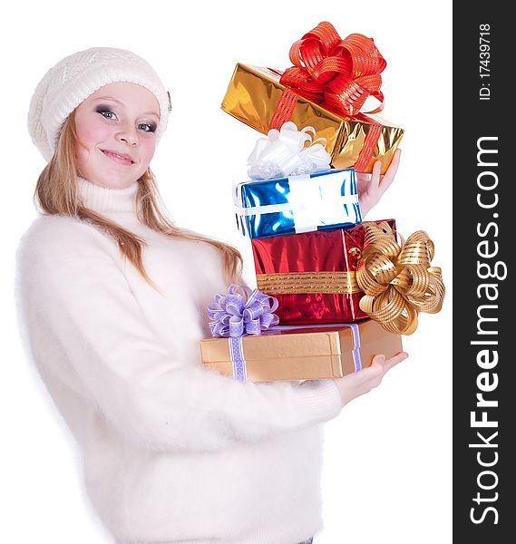 Beautiful girl with stack gift box. Isolated.