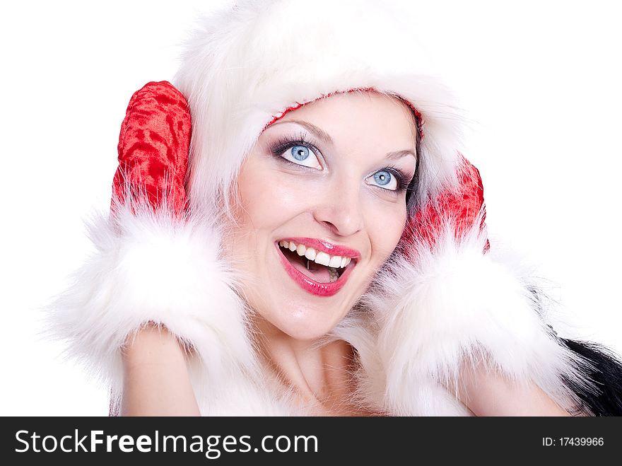 Young smiling beautiful girl in santa claus hat