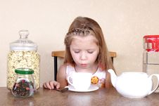 Little Girl Blowing To Cup Of Hot Drink Royalty Free Stock Images Little Girl Blowing To Cup Of Hot Drink Royalty Free Stock Images