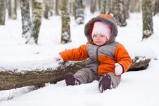 Baby Sit On Snow In Park Near Tree Stock Images Baby Sit On Snow In Park Near Tree Stock Images