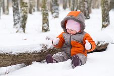 Cute Baby Sit On Snow And Play With Mittens Stock Photo Cute Baby Sit On Snow And Play With Mittens Stock Photo