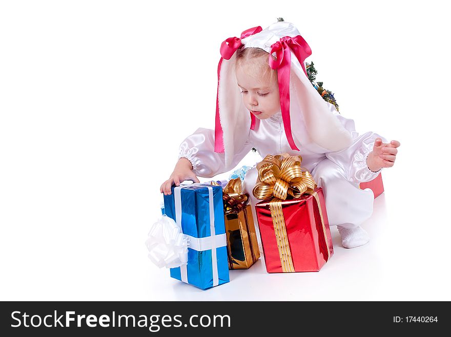 Child in a white downy bunny costume. Child in a white downy bunny costume.