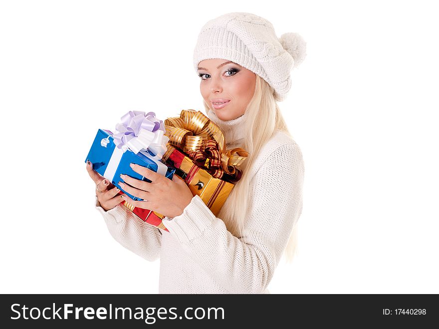 Girl holding a presents on white background