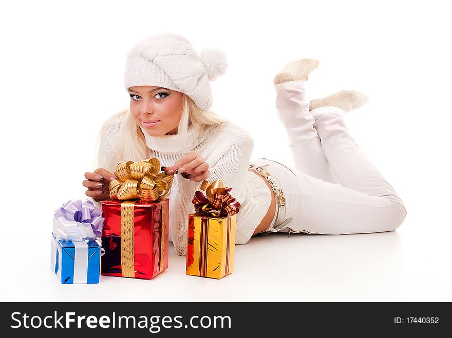 Girl holding a presents on white background