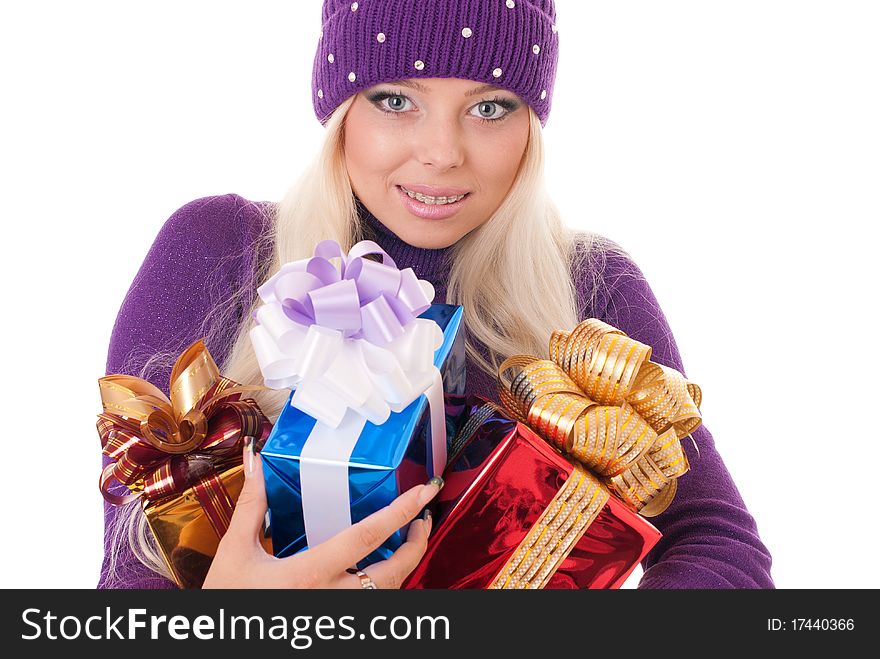 Girl holding a presents on white background. Girl holding a presents on white background